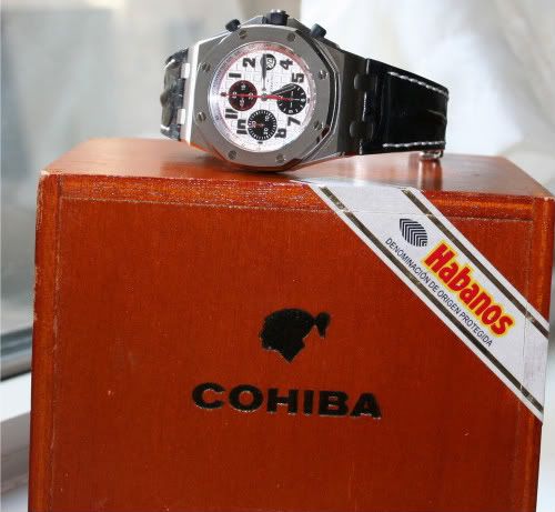 http://i1032.photobucket.com/albums/a405/jonniegumbo/WatchPhotos014-1.jpg