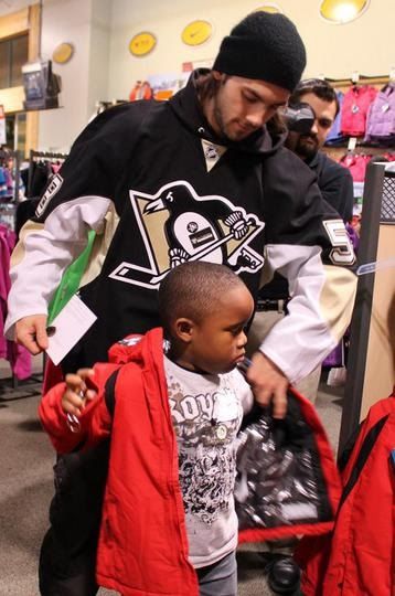 Kris Letang with kid.